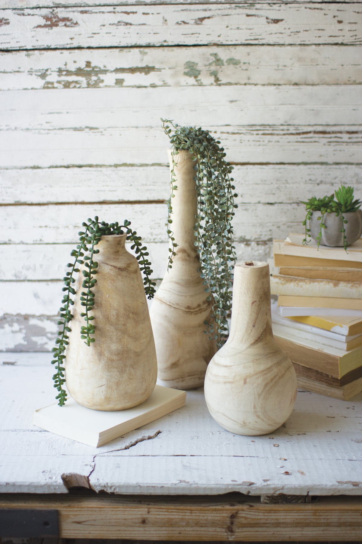 Set of Three Hand-Carved Tall Wooden Bottles