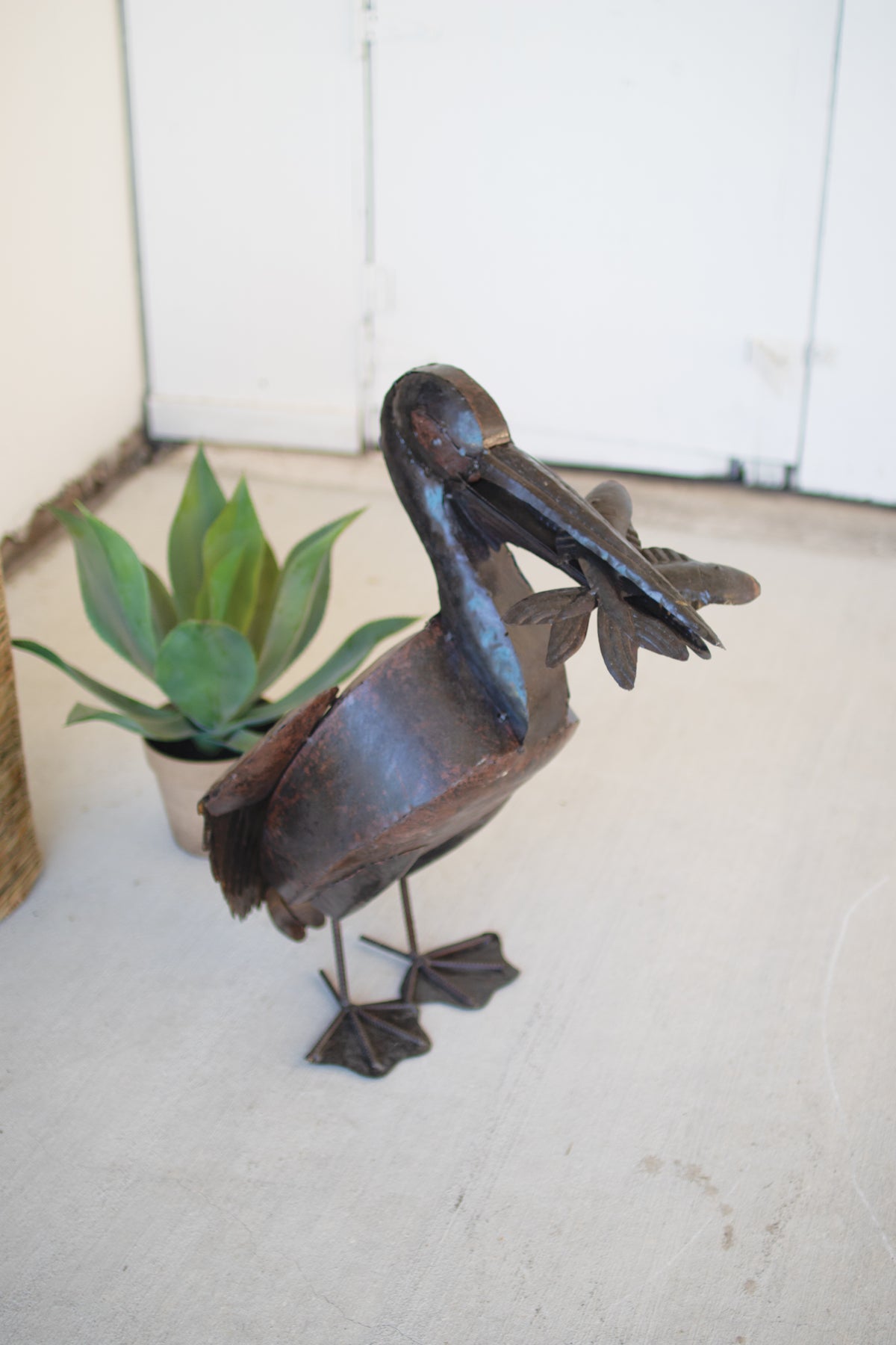 Rustic Recycled Metal Pelican with Fish