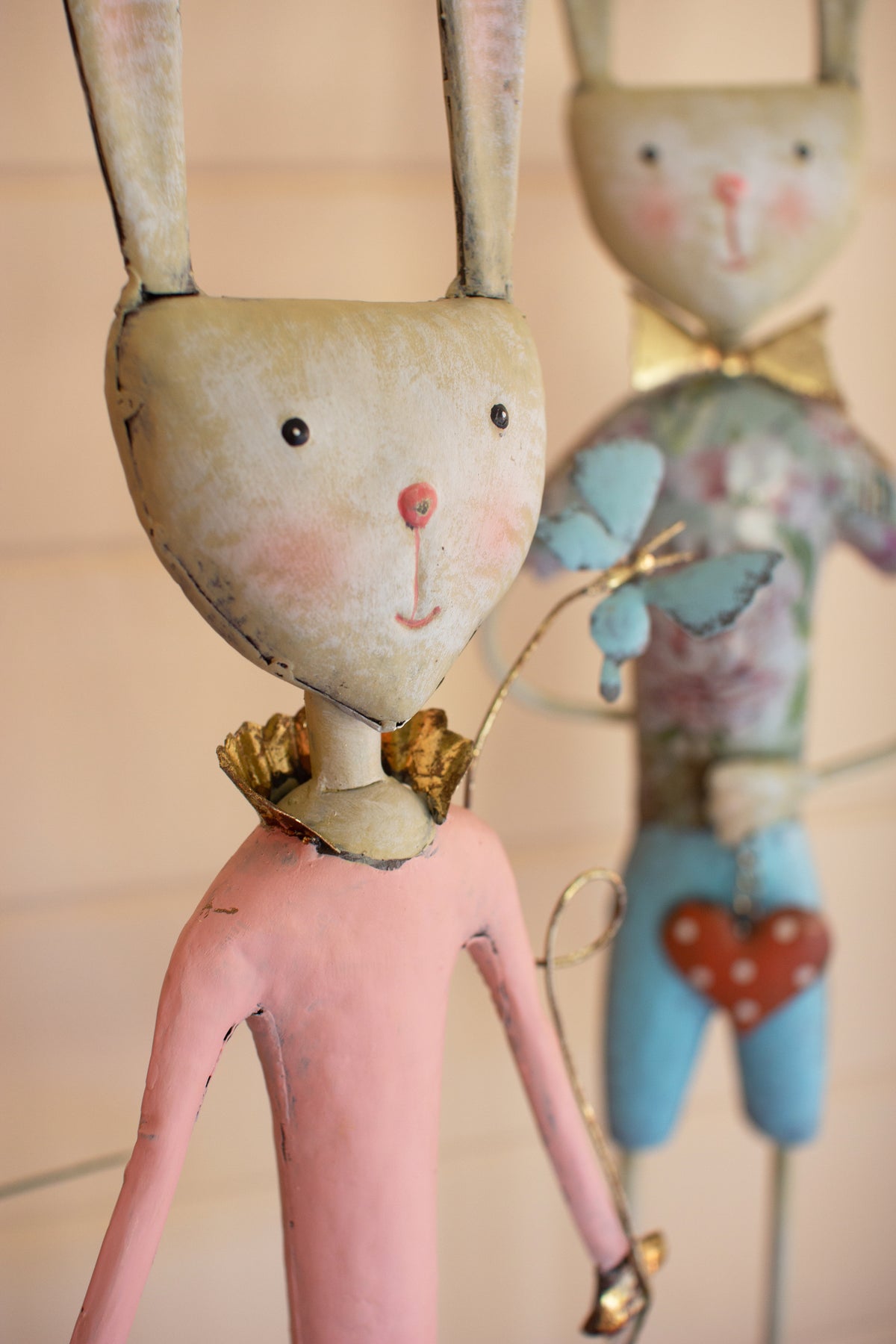 Set of Two Painted Metal Long-Legged Boy and Girl Rabbits
