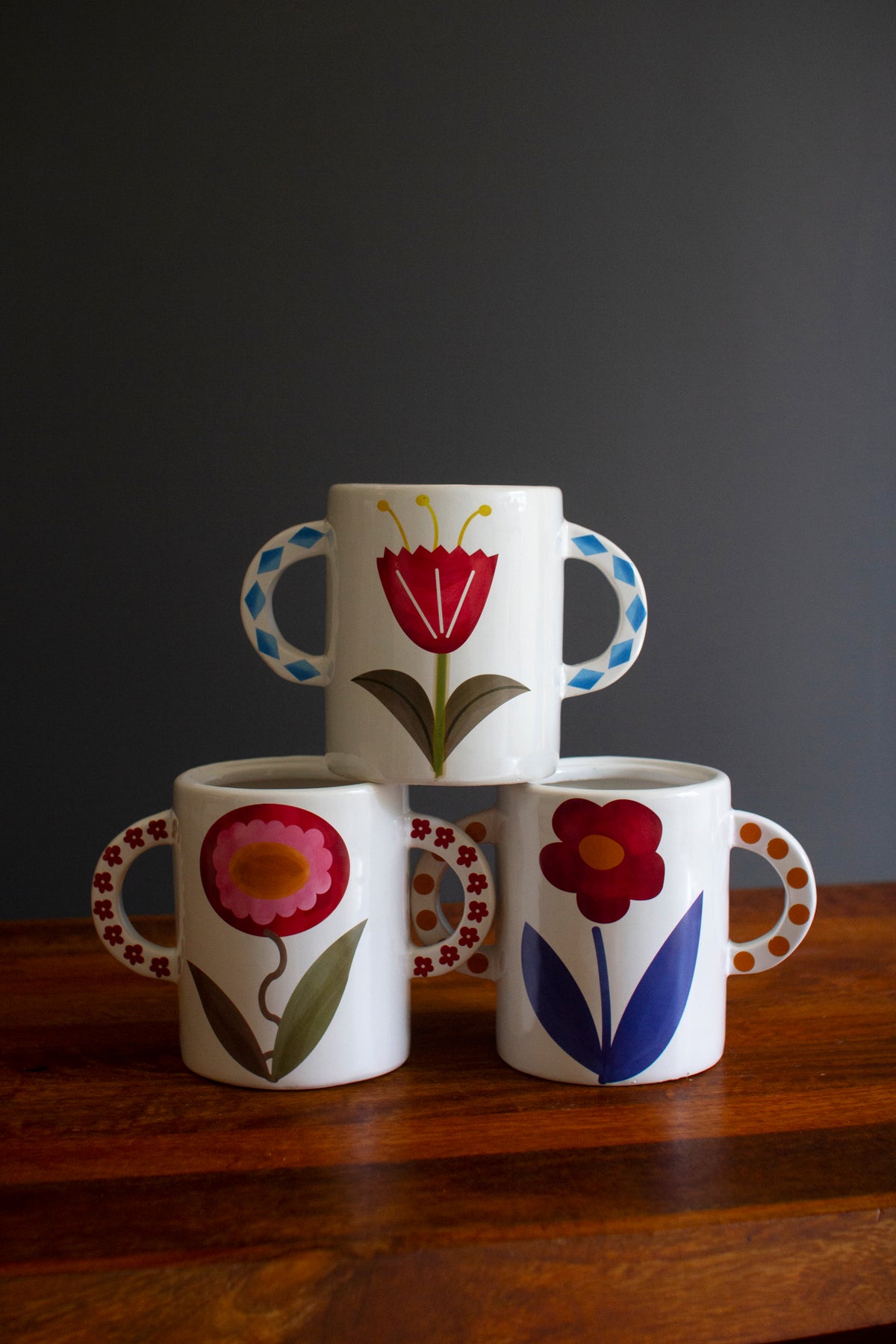 Set of Three Ceramic Doule Handle Vases with Flowers