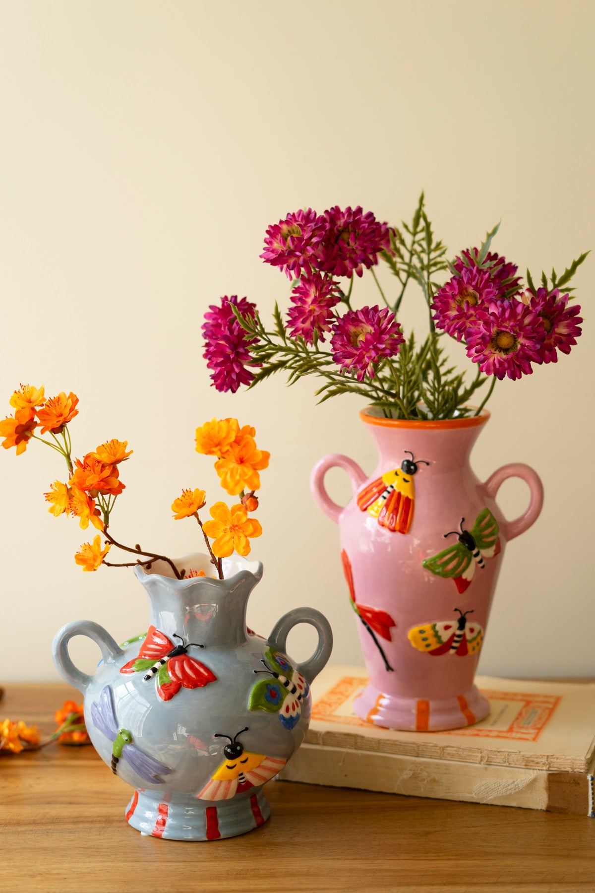 Set of Two Ceramic Butterfly and Moth Vases