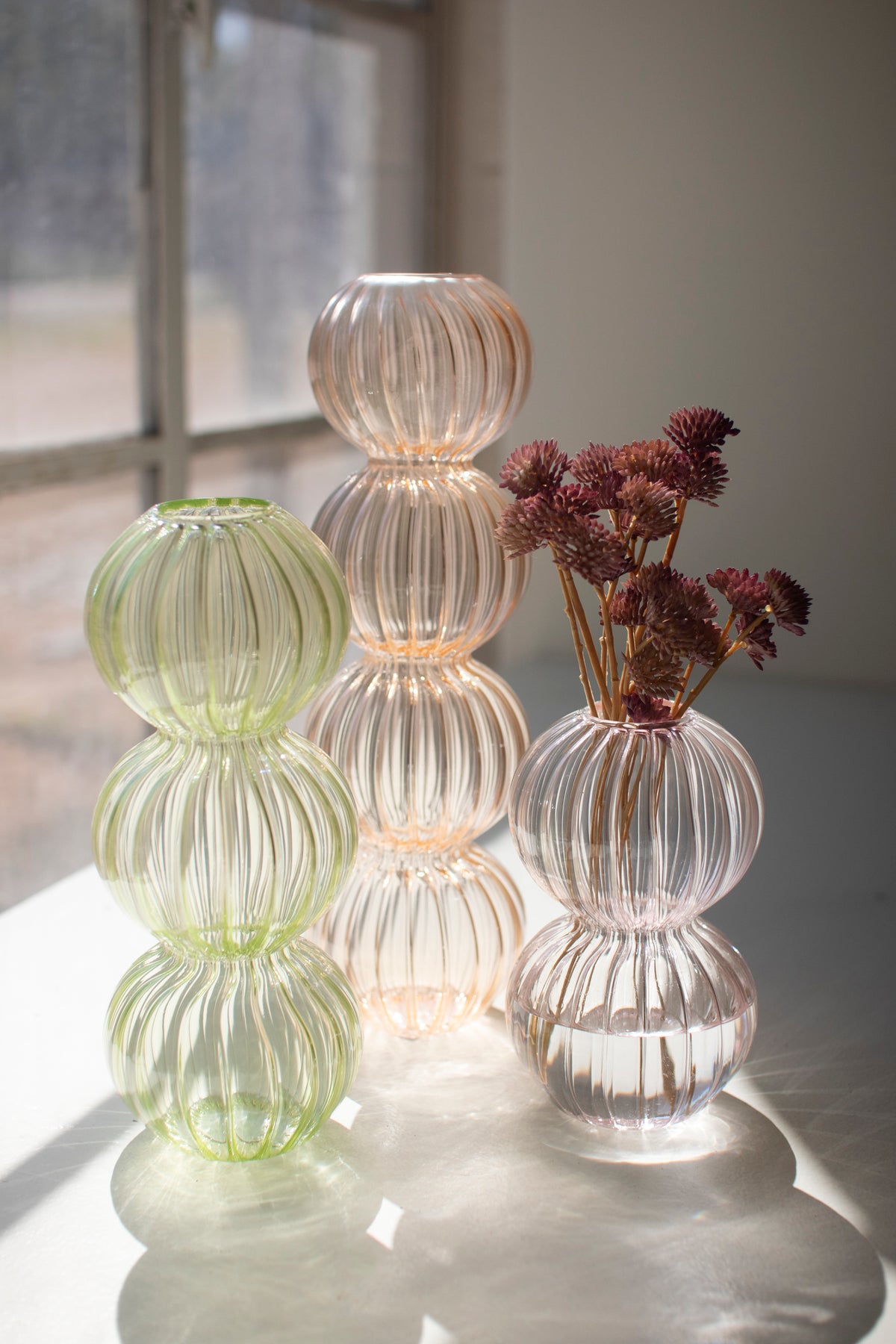 Set of Three Fluted Glass Stacking Ball Vases - One Each Color