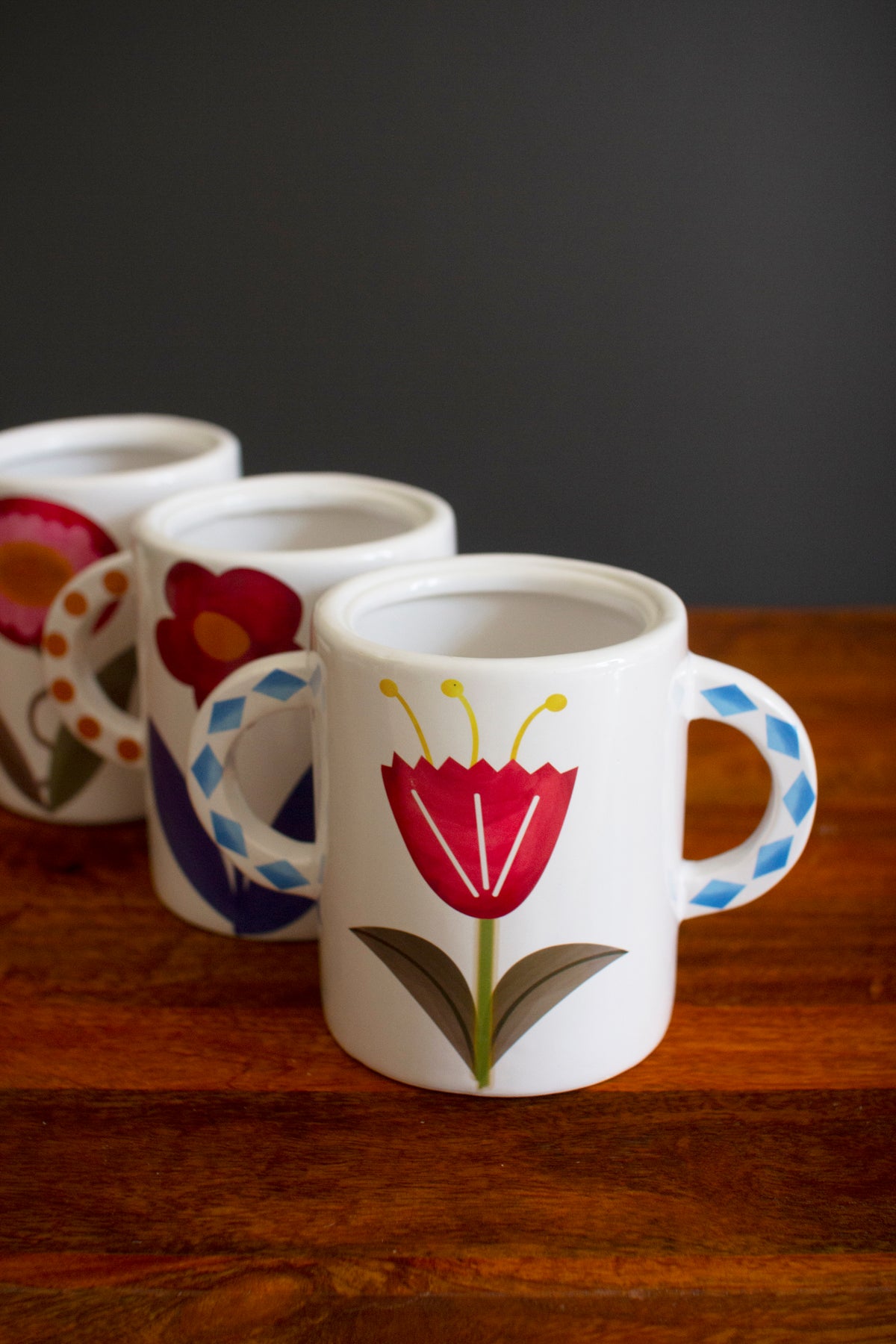 Set of Three Ceramic Doule Handle Vases with Flowers