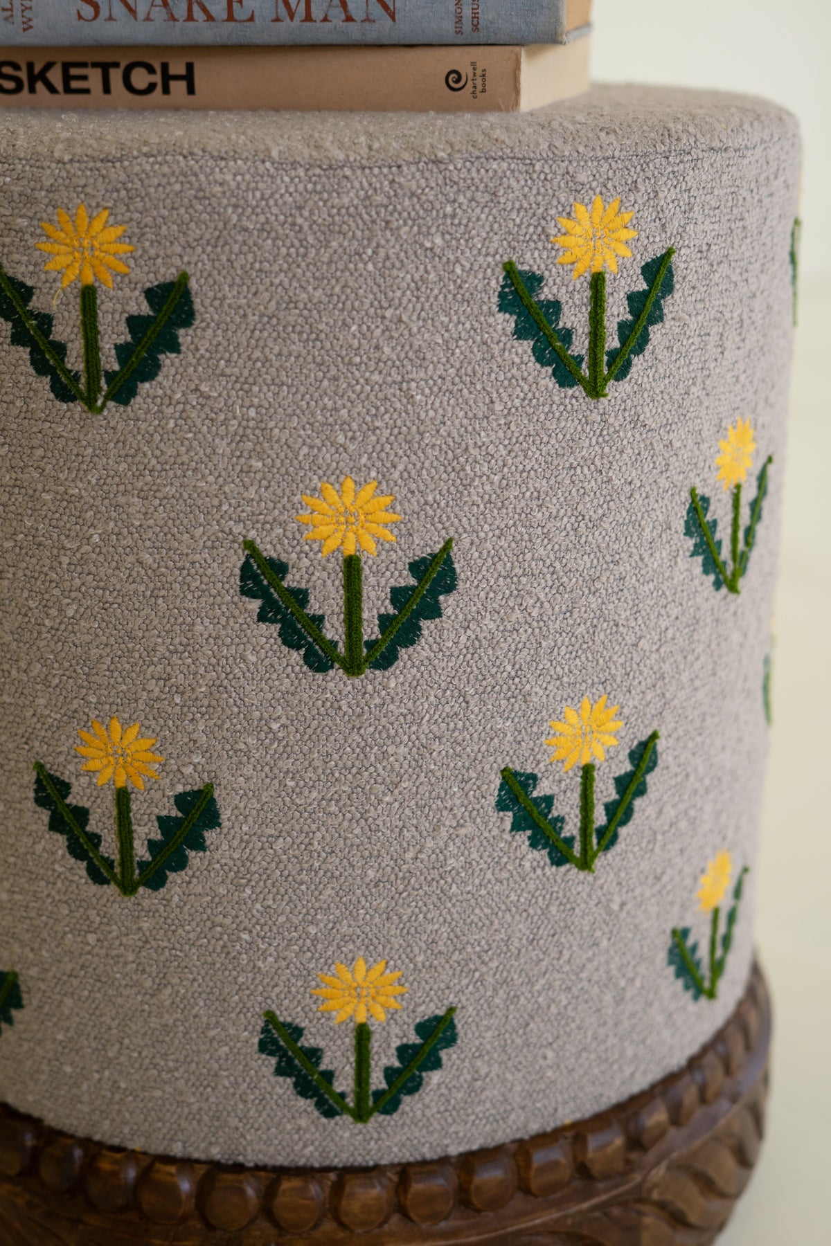 Upholstered Ottoman with Carved Wood Base - Grey