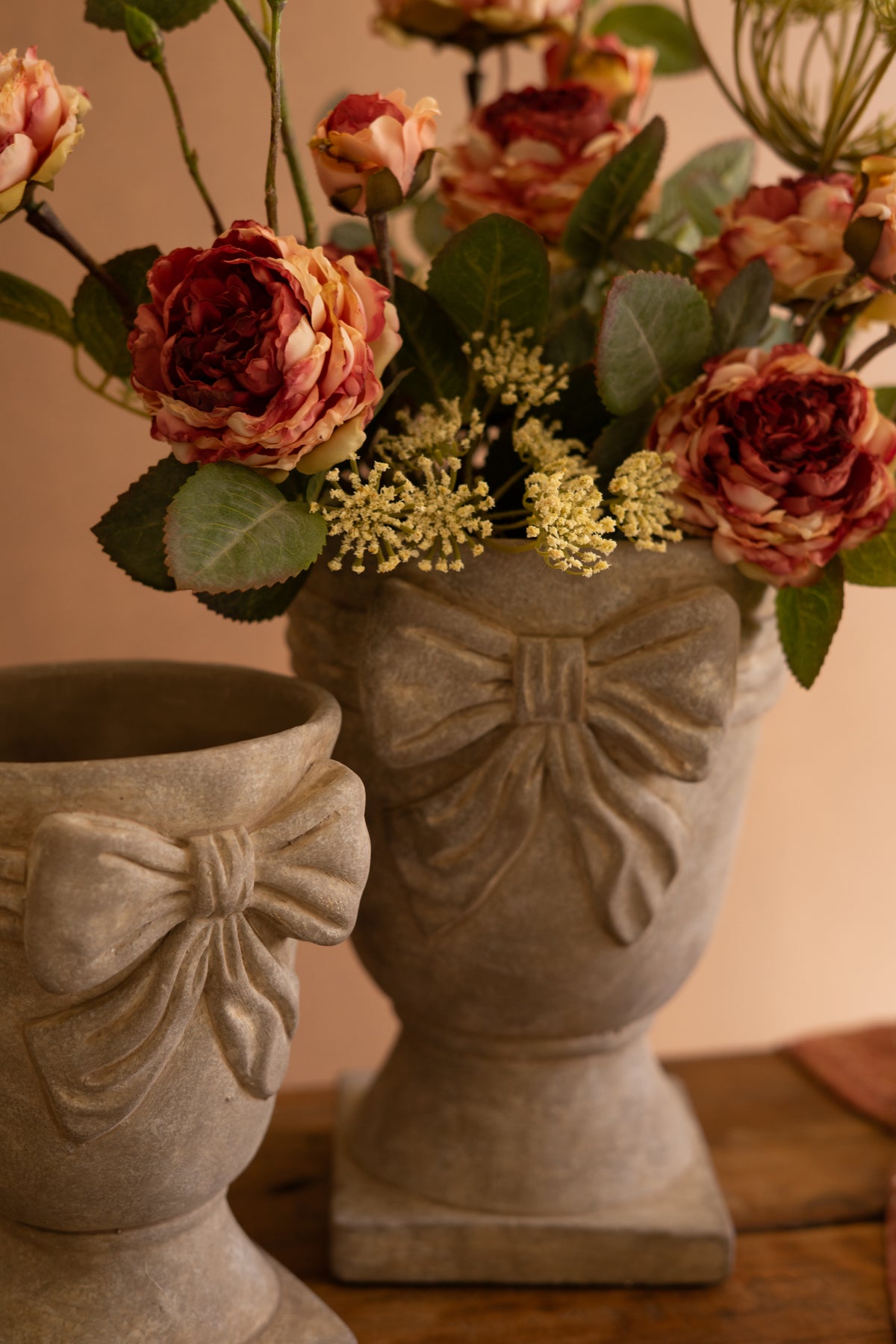 Set of Two Concrete Urns with Bow Detail